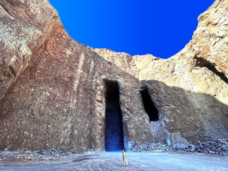 Interior view of a salt mine tunnel with rock walls